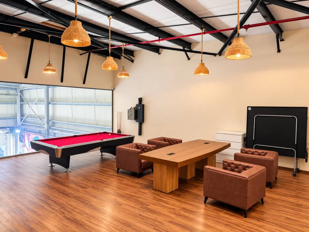 Customer lounge at Gomaa Garage with a pool table and comfortable seating